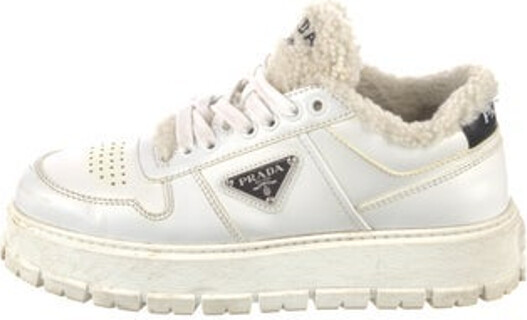 Prada Leather Low Top Sneakers White Enameled Metal Triangle Shearling Trim Round-Toes Platform Lace-Up Closure at Uppers