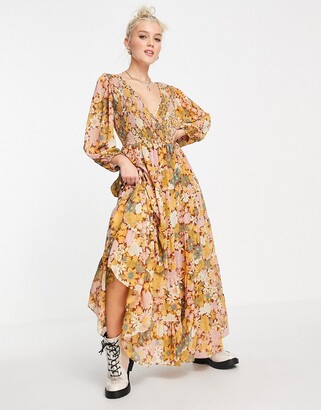 ASOS DESIGN shirred wrap tiered skirt maxi dress in mustard floral print -  ShopStyle