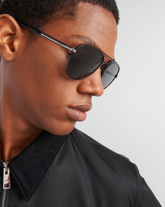 Prada Sunglasses with iconic metal plaque - ShopStyle