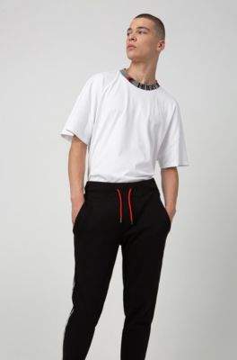 HUGO Cotton jogging trousers with chevron-print logo tape