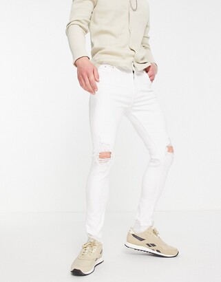 Bershka super skinny jeans with rips in white - ShopStyle