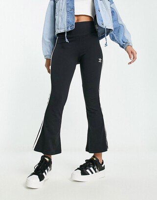 https://img.shopstyle-cdn.com/sim/76/29/76291978c5a0eebe8b7a94c64ad259ce_xlarge/adidas-originals-3-stripes-cropped-flare-leggings-in-black.jpg