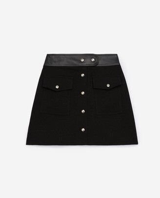 The Kooples Short black skirt in wool with leather belt
