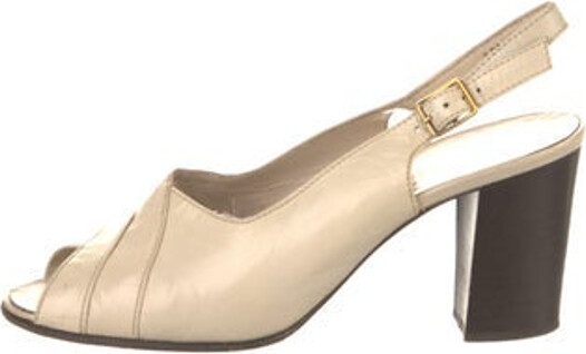 Saks Fifth Avenue Leather Slingback Pumps Neutrals Peep-Toes Crossover Straps & Buckle Closure at Ankles Includes Box Unfortunately, due to restrictions, this item may not be eligible for shipping in all areas.