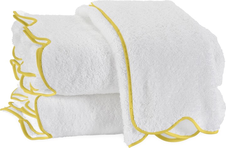 https://img.shopstyle-cdn.com/sim/76/7e/767e98f9a8025dde615dfcff1dd11c39_best/cairo-scalloped-edge-cotton-bath-towel.jpg