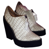 Thumbnail for your product : Jeffrey Campbell White Leather Ankle boots