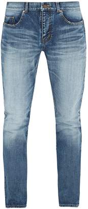 Saint Laurent Star-stud distressed skinny jeans