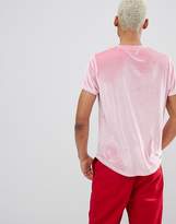 Thumbnail for your product : ASOS Design DESIGN longline t-shirt with curved hem in pink velour