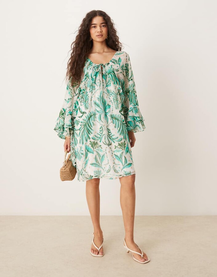Hope & Ivy tie neck frill sleeves mini dress in green palm print