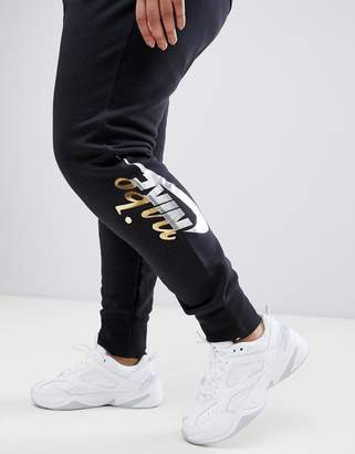 Nike Plus Black Sweatpants With Metallic Logo