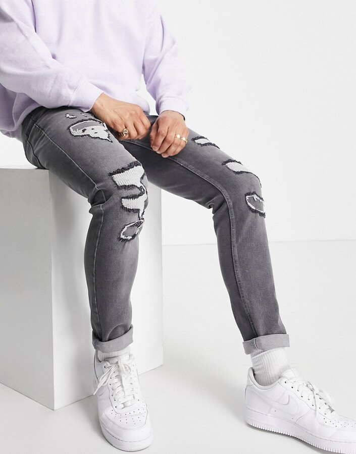 Topman stretch skinny jeans with rip and repair in grey - ShopStyle