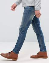 Thumbnail for your product : ASOS Design Skinny Jeans In 12.5oz Mid Blue