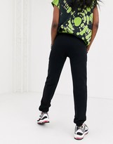 Thumbnail for your product : Collusion Tall skinny joggers in black