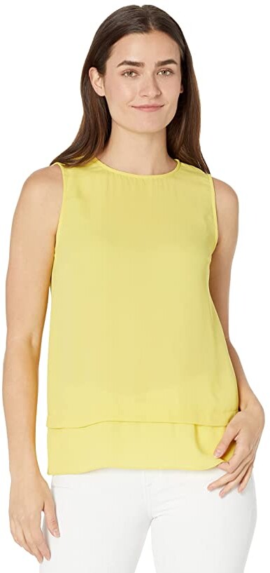 yellow sleeveless top