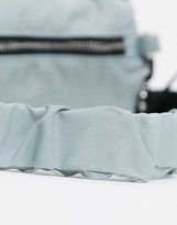 Thumbnail for your product : ASOS DESIGN 90's mini cross body barrel bag in light grey