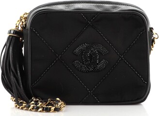 Chanel, Vintage black Lambskin quilted shoulder bag with tassel and gold  hardware. - Unique Designer Pieces