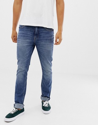 cheap monday tapered jeans