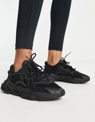 adidas Ozweego trainers in triple black - ShopStyle