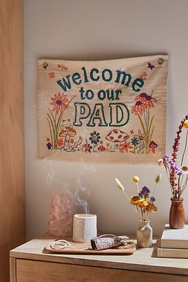 https://img.shopstyle-cdn.com/sim/78/c0/78c06eadabce7ce3d47462508ea8c831_xlarge/welcome-to-our-pad-embroidered-tapestry.jpg