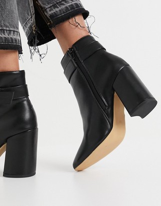 London Rebel block heel ankle boots with gold trim in black