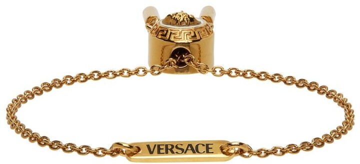 Versace Coin Bracelet in Metallic Gold - ShopStyle