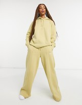 Thumbnail for your product : Nike mini swoosh high waisted wide leg joggers in olive green