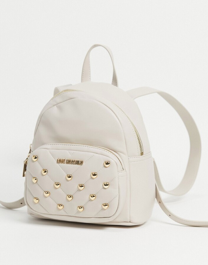 cream backpack purse