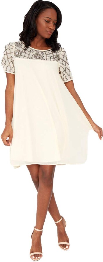 cream shift dress