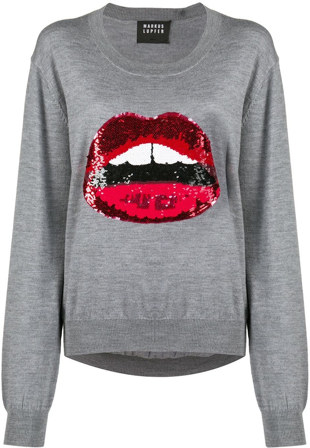 red jumper with sequin lips