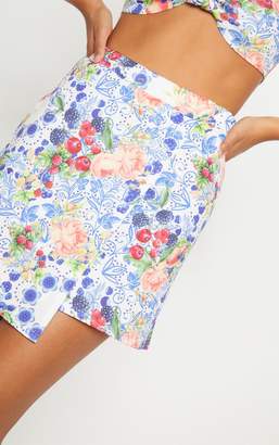PrettyLittleThing Blue Fruit Printed Dip Hem Mini Skirt