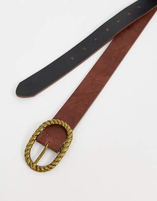 ASOS Design DESIGN faux leather slim belt in vintage tan and burnished gold oval buckle
