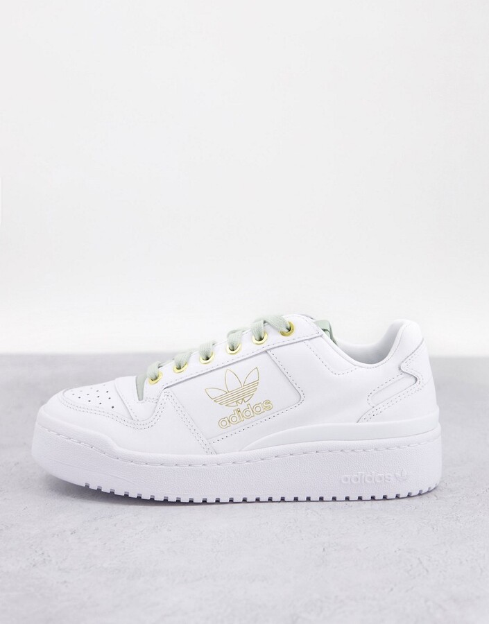 adidas Forum Bold sneakers in white with matte gold detail - ShopStyle  Trainers \u0026 Athletic Shoes