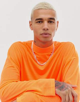 ASOS Design DESIGN oversized turtle neck t-shirt with long sleeves in neon orange