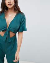 Thumbnail for your product : ASOS DESIGN tea jumpsuit with cut out and tie detail in linen