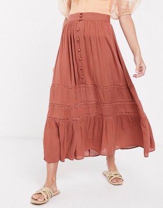 ASOS DESIGN Petite tiered crinkle maxi skirt with lace insert in brown