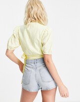 Thumbnail for your product : Hope & Ivy volume sleeve broderie wrap top with bow tie in lemon