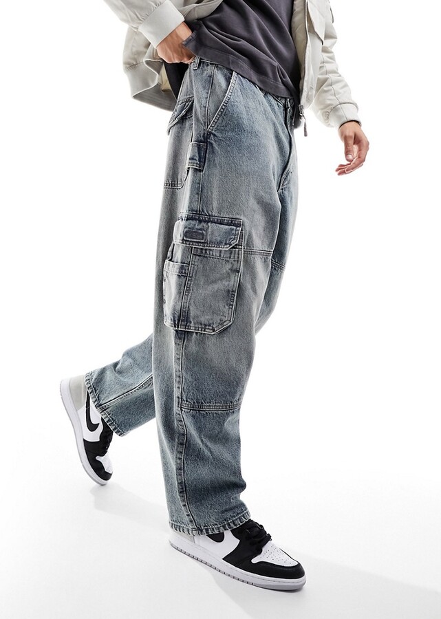 Bershka skater cargo pocket jeans in mid blue - ShopStyle