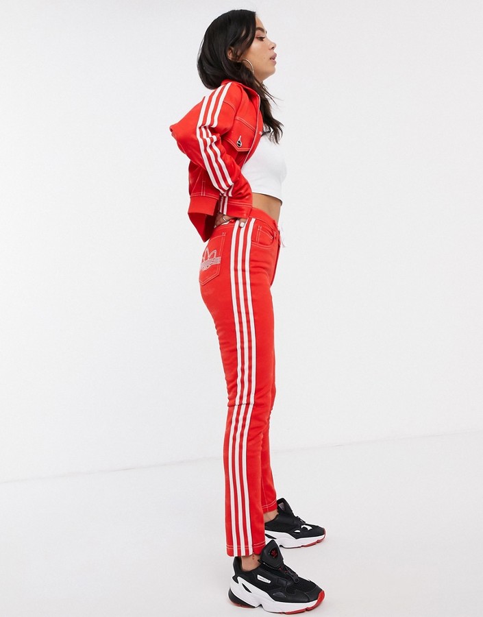 adidas originals adicolor three stripe track pants in red
