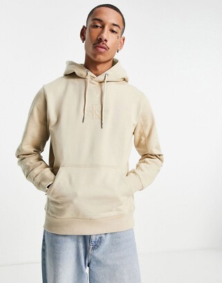 Calvin Klein Jeans acid wash hoodie in stone - ShopStyle