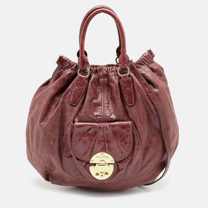 Miu Miu Blue Vitello Lux Bow Small Handbag ○ Labellov ○ Buy and Sell  Authentic Luxury