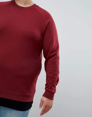 ASOS DESIGN plus sweatshirt in burgundy with hem extender