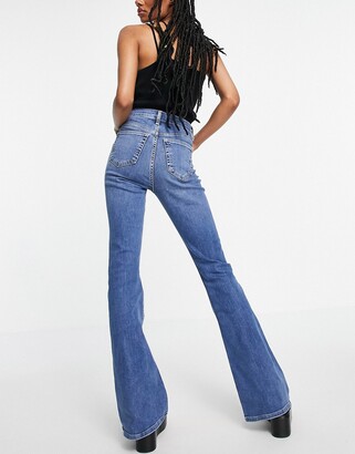 Topshop Jamie flared jeans in mid blue - ShopStyle