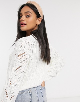 Pieces sweater with knitted pattern in cream