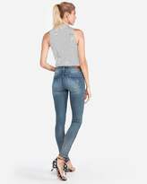 Thumbnail for your product : Express Mid Rise Denim Perfect Medium Wash Skinny Jeans