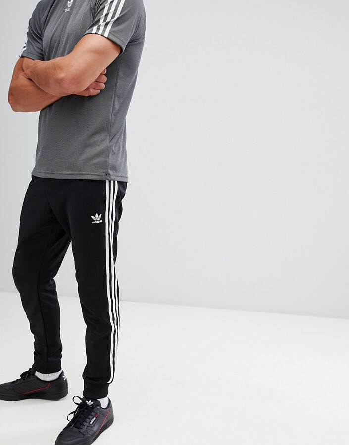 adidas Skinny joggers cuffed black - ShopStyle Trousers