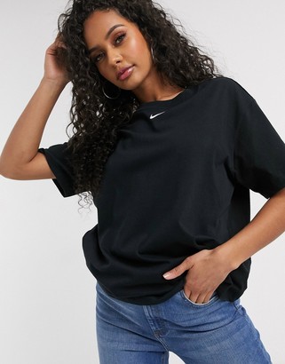 Nike central swoosh oversized boyfriend t-shirt in black - ShopStyle  Activewear Tops