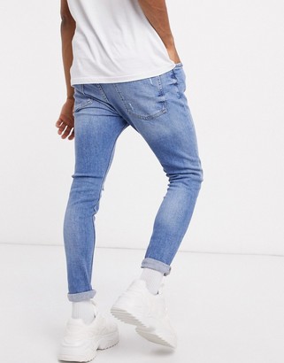 Bershka Join Life super skinny jeans in mid blue - ShopStyle
