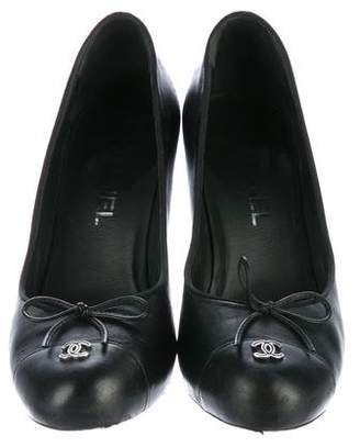 Chanel CC Leather Bow-Accented Pumps