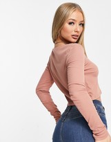 Thumbnail for your product : NA-KD ribbed button detail crop top in pink