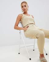 Thumbnail for your product : Missguided sleeveless tie waist jumpsuit in beige
